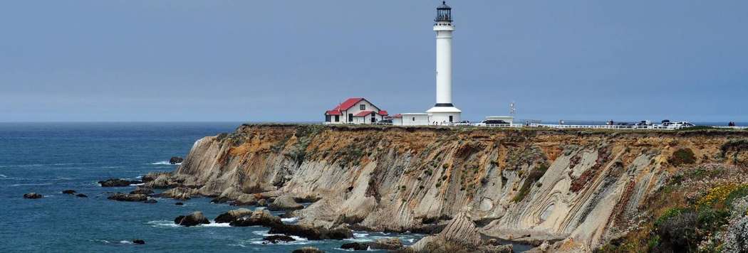 Point Arena lighthouse on the headland above the Mendocino coast
