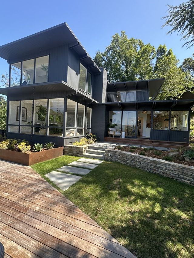 Modern home and garden at golden hour